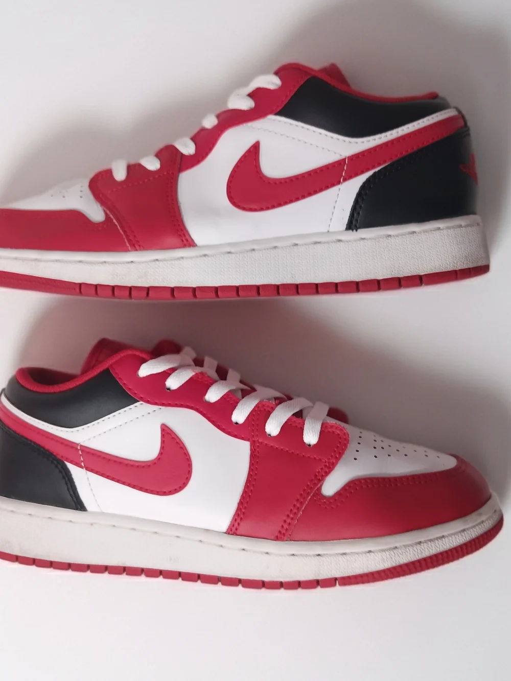 Nike Air Jordan 1 Low Grade School Sneakers. (